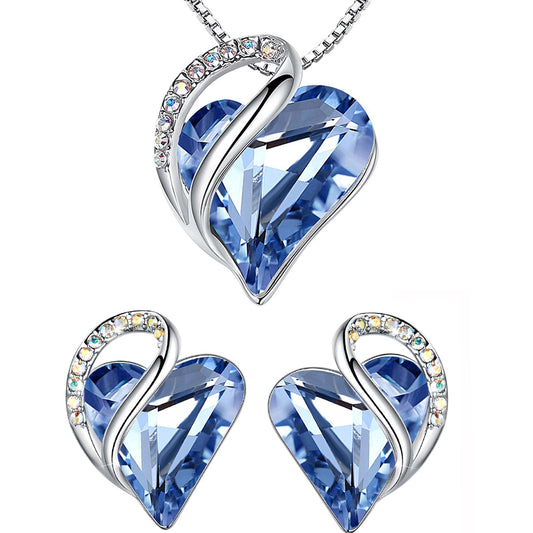 Dollcini Set Bijuterii Inimă Argintie – Colier cu Cristal și Cercei pentru Femei